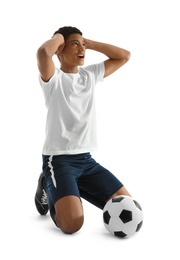 Photo of Teenage African-American boy playing football on white background