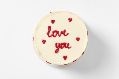 Photo of Bento cake with text Love You on white table, top view. St. Valentine's day surprise