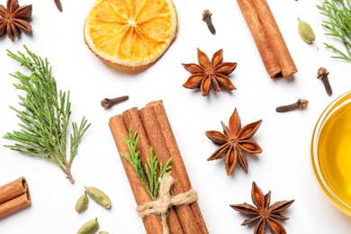 Photo of Composition with mulled wine ingredients on white background, top view