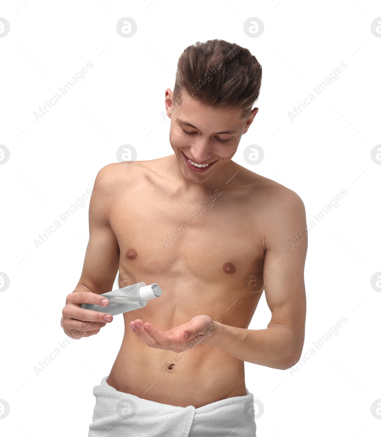 Photo of Handsome man with lotion on white background