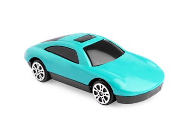Photo of One turquoise car isolated on white. Children`s toy