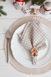 Photo of Beautiful festive place setting with stylish decor for Christmas dinner on white wooden table, flat lay