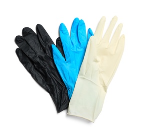 Photo of Different medical gloves on white background, top view