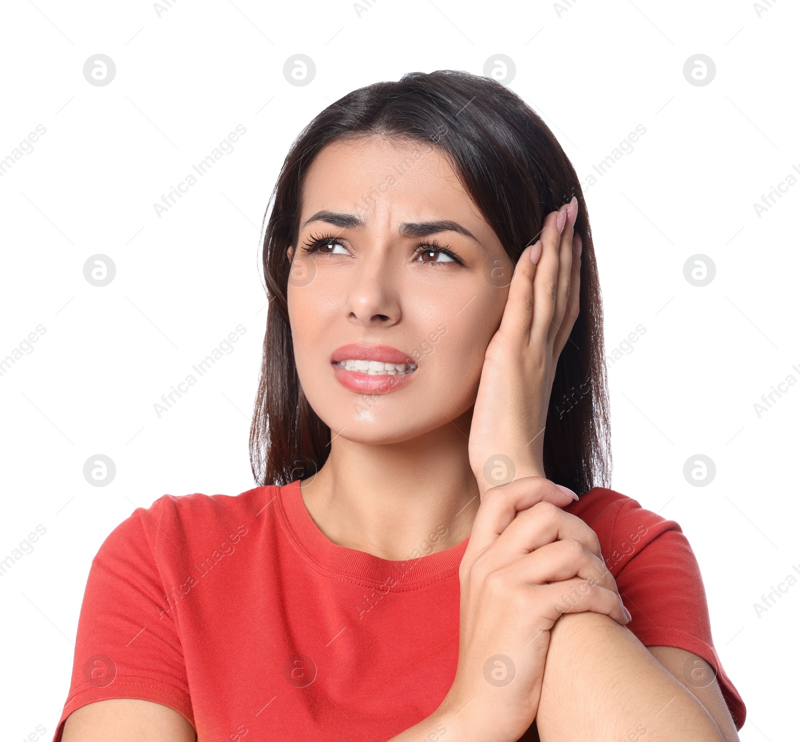 Photo of Young woman suffering from ear pain on white background