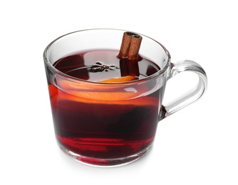 Photo of Glass cup of mulled wine isolated on white