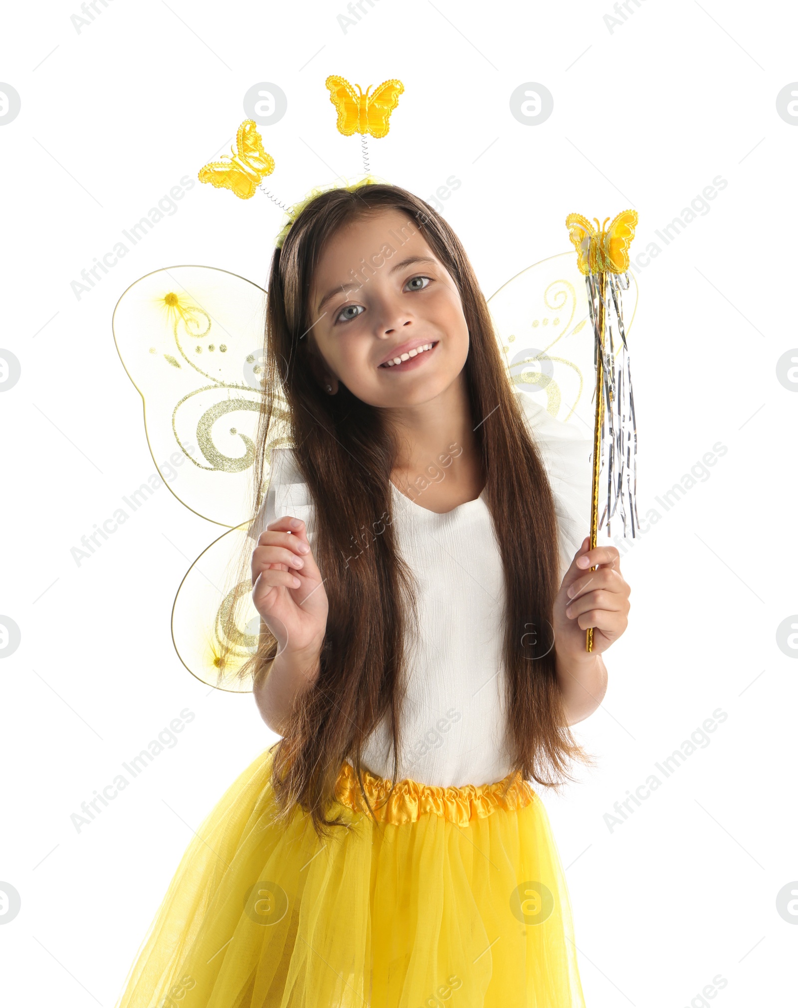 Photo of Cute little girl in fairy costume with yellow wings and magic wand on white background