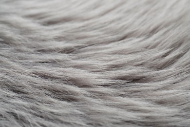 Photo of Beautiful white faux fur as background, closeup view