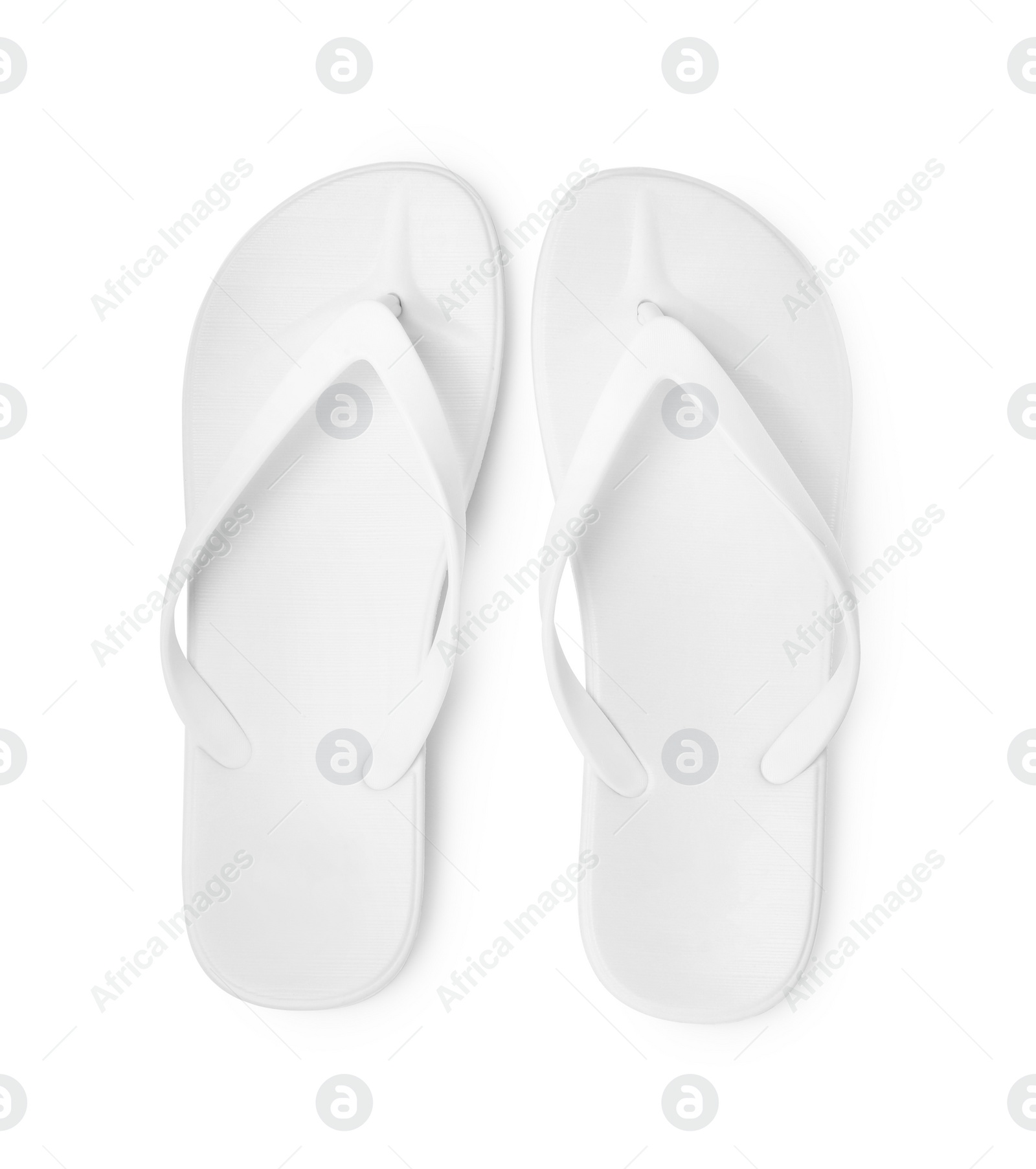 Photo of Pair of stylish flip flops isolated on white, top view