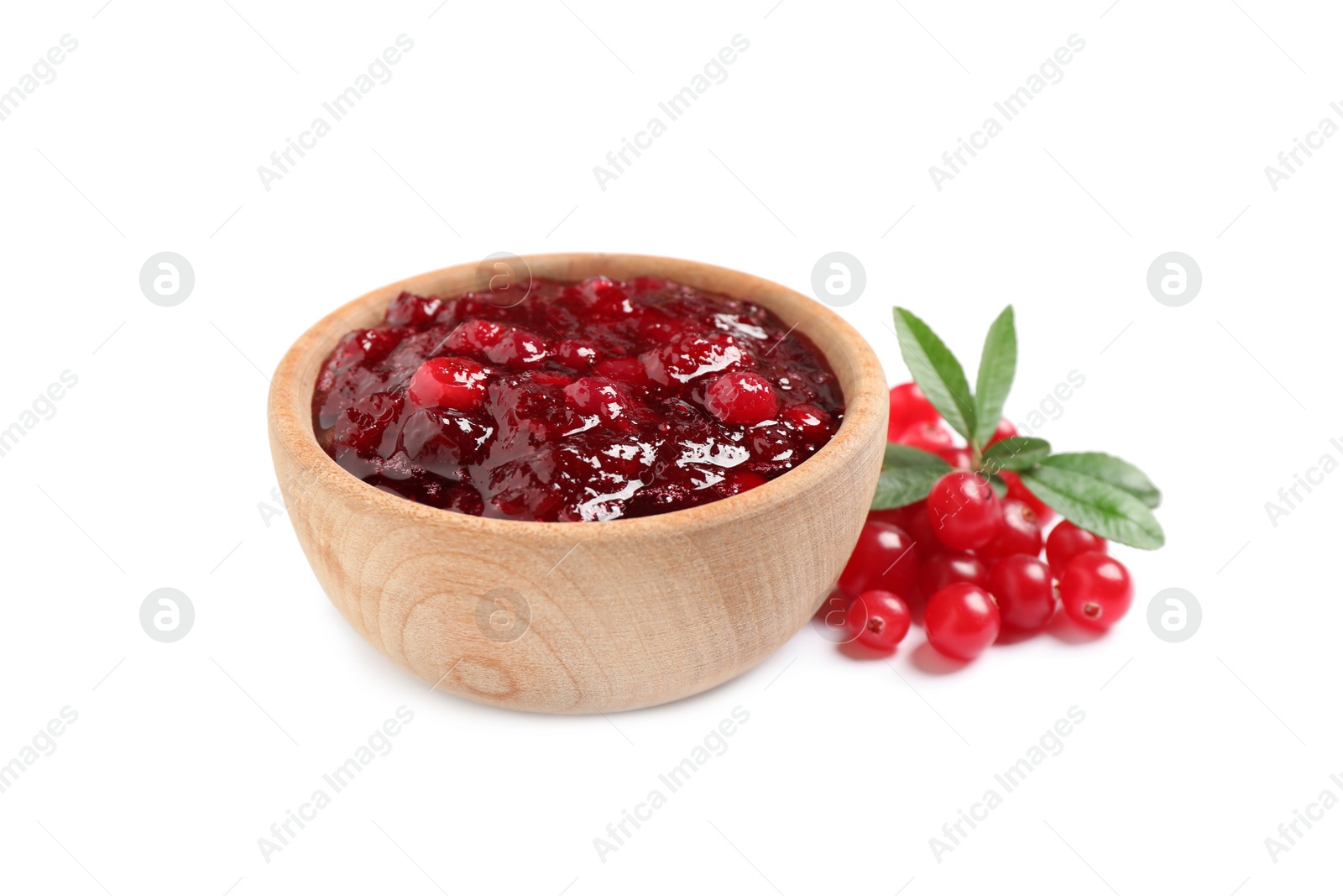 Photo of Cranberry sauce and fresh berries on white background