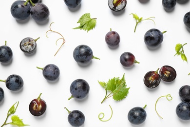 Fresh ripe juicy grapes on white background, top view