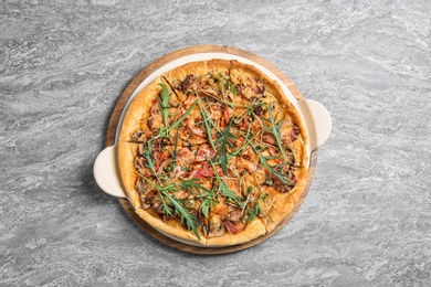 Photo of Tasty homemade pizza on table, top view