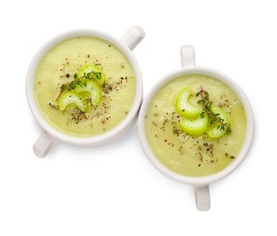 Photo of Delicious celery soup on white background, top view