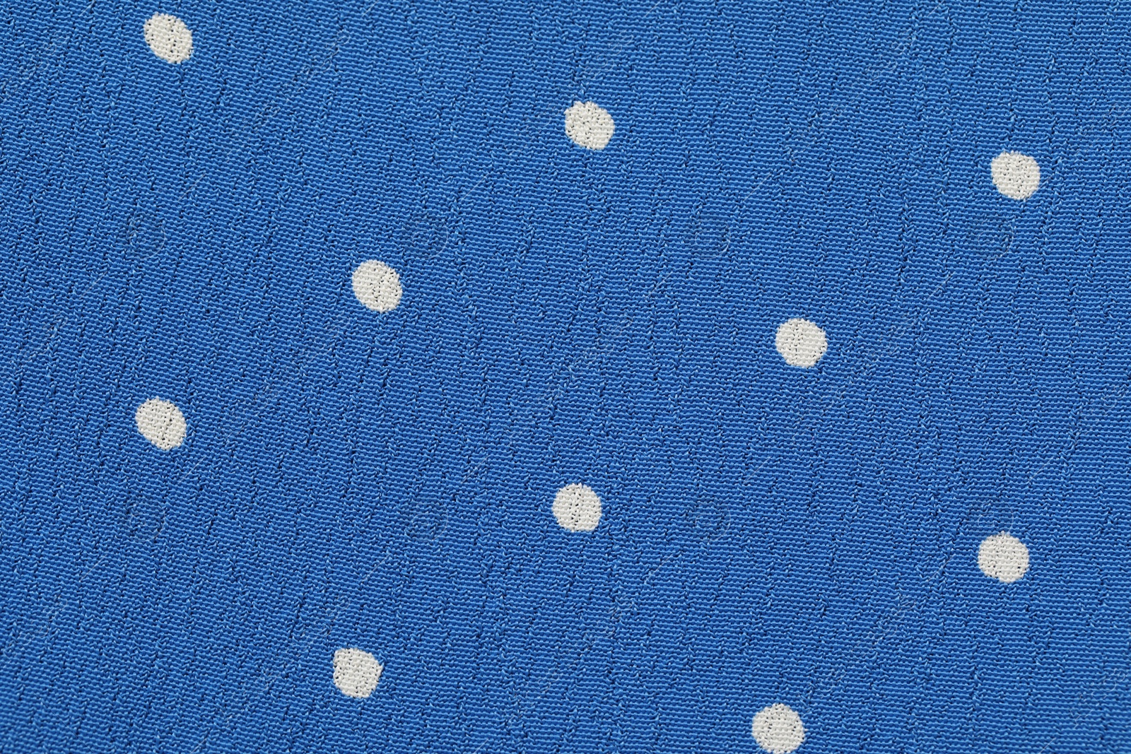 Photo of Texture of polka dot fabric as background, top view