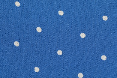 Texture of polka dot fabric as background, top view