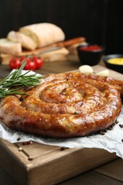 Photo of Delicious homemade sausage with spices served on table, closeup