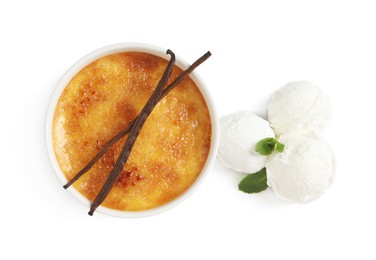Photo of Delicious creme brulee with vanilla sticks, scoops of ice cream and mint on white background, top view