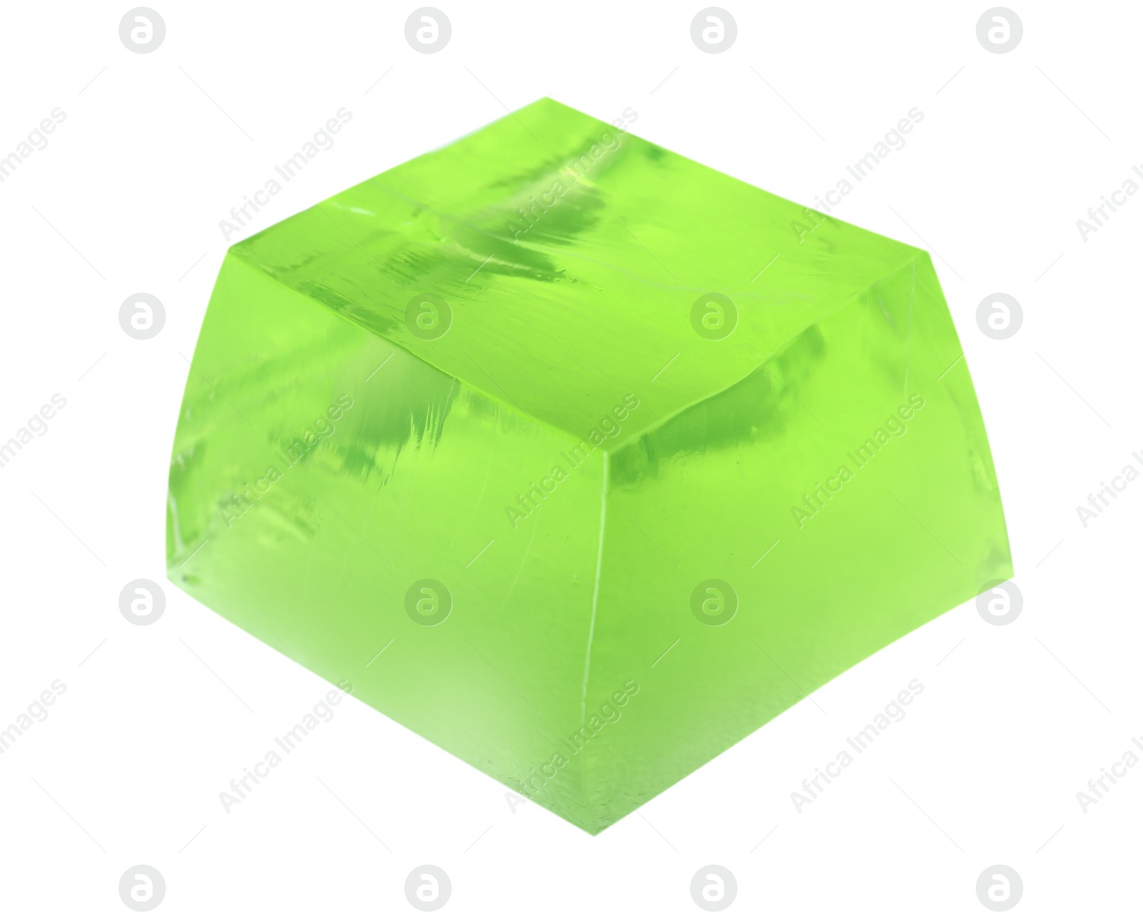 Photo of Delicious green jelly cube on white background