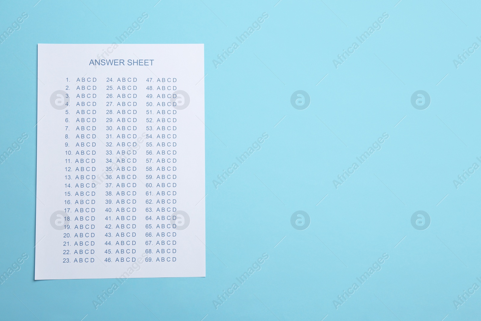 Photo of Answer sheet on color background, top view with space for text