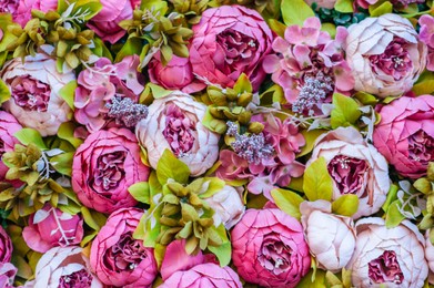 Photo of Beautiful bouquet of different flowers as background, top view