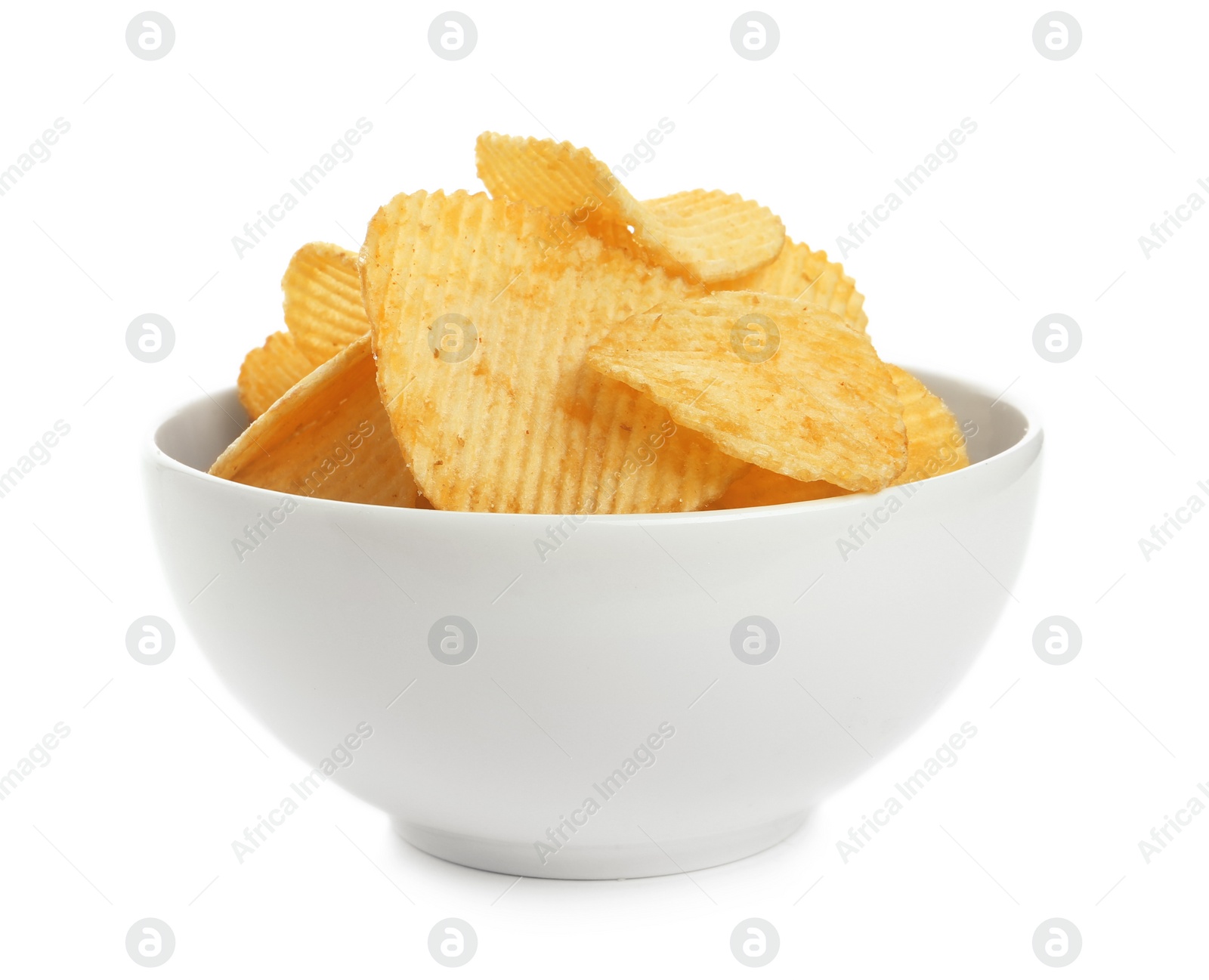 Photo of Bowl of tasty ridged potato chips on white background