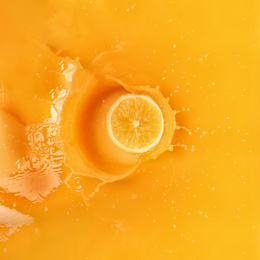 Delicious orange slice in juice, top view