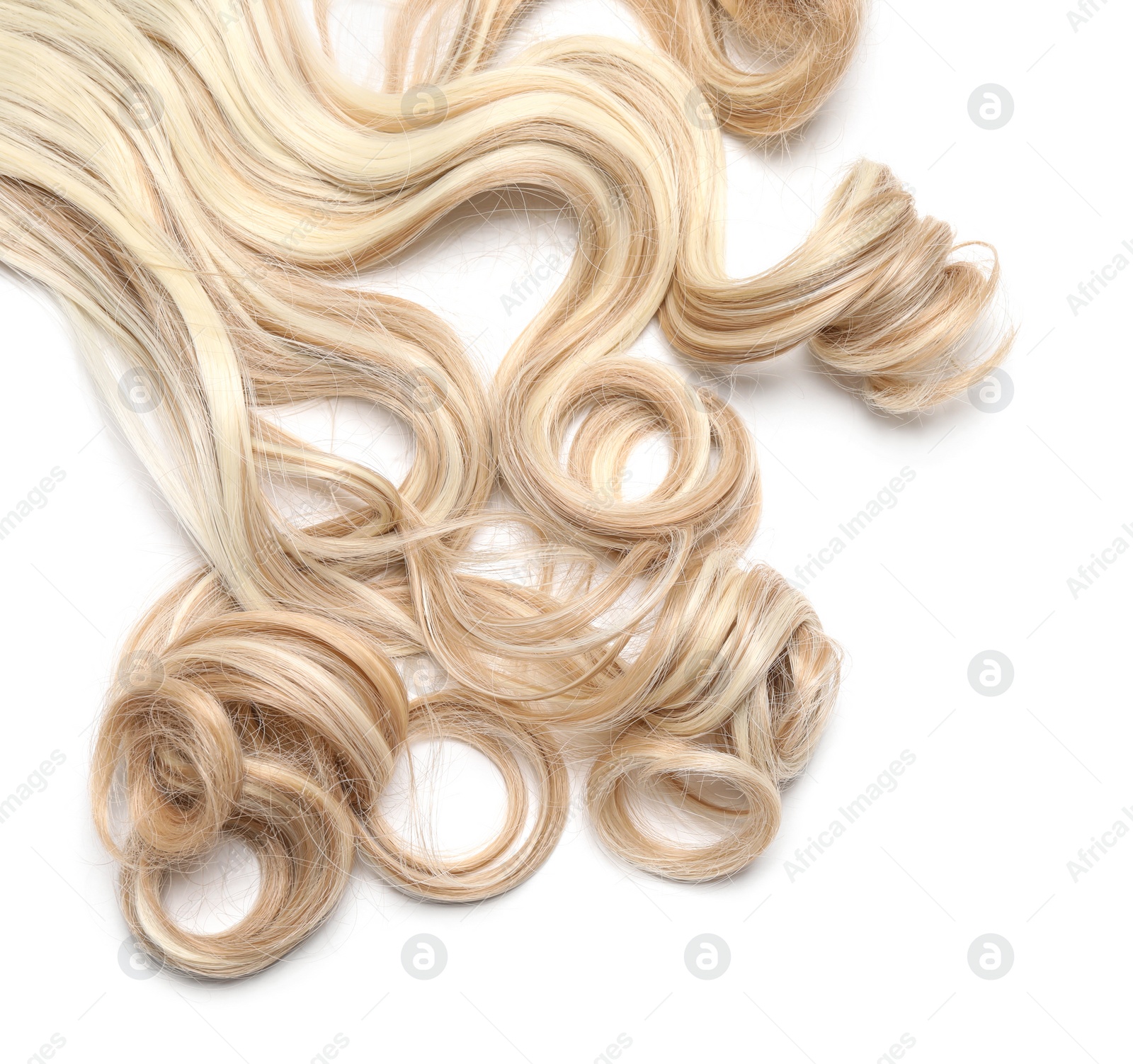 Photo of Beautiful blonde curly hair isolated on white, top view