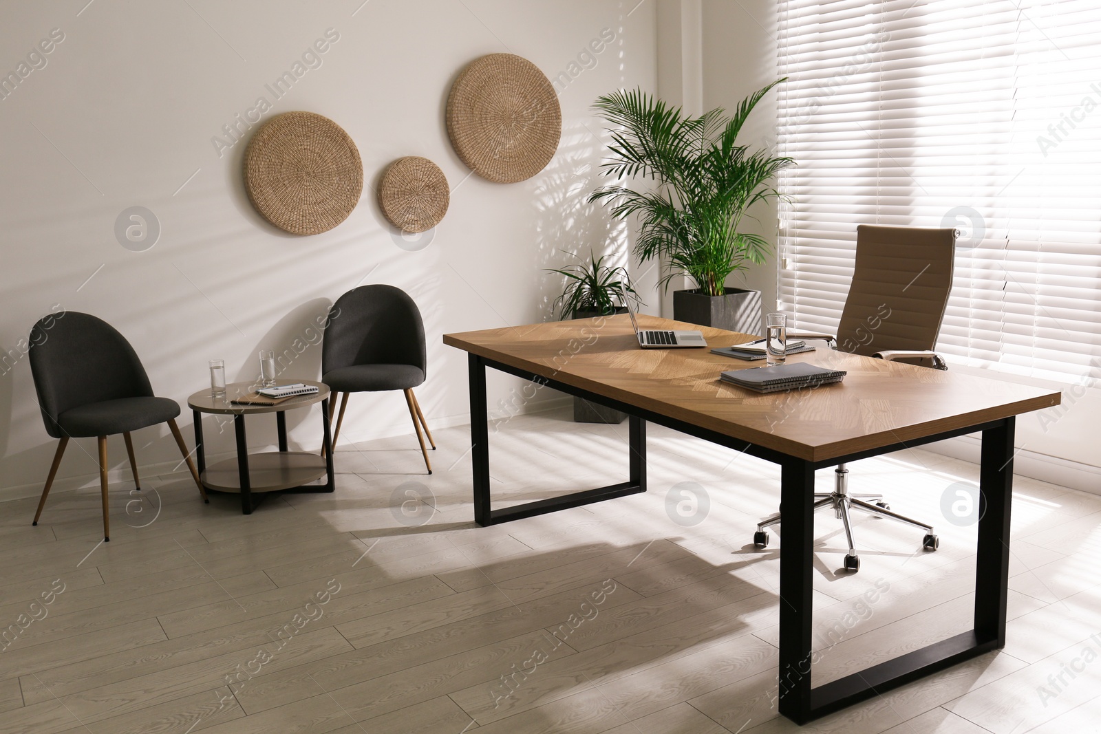 Photo of Director's office with large wooden table. Interior design