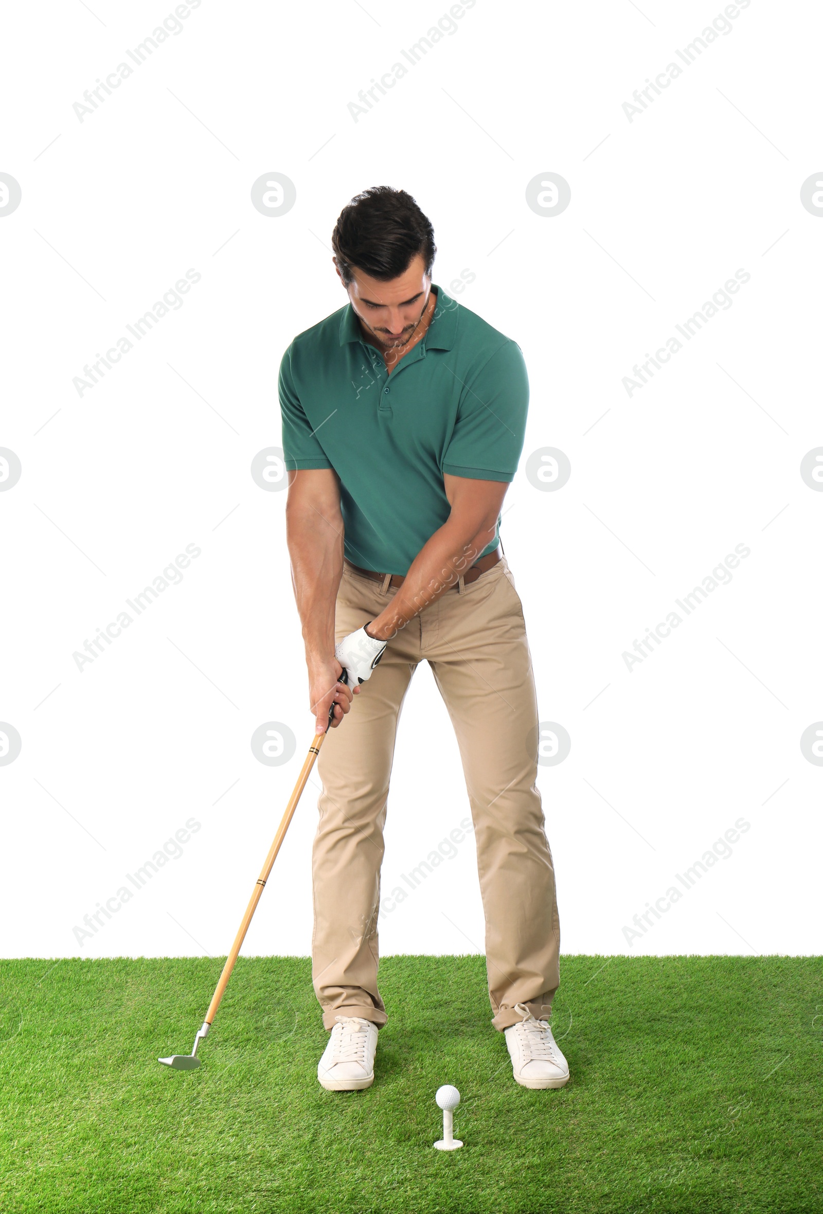 Photo of Young man playing golf on white background