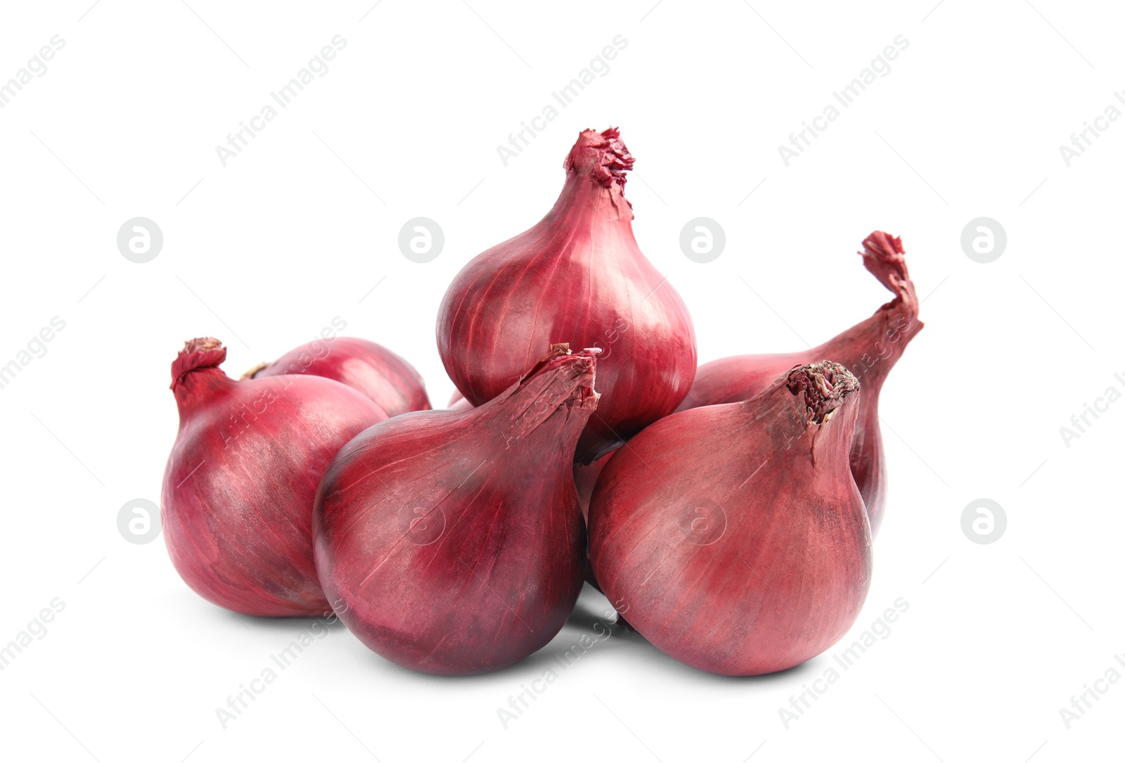 Photo of Ripe red onions on white background