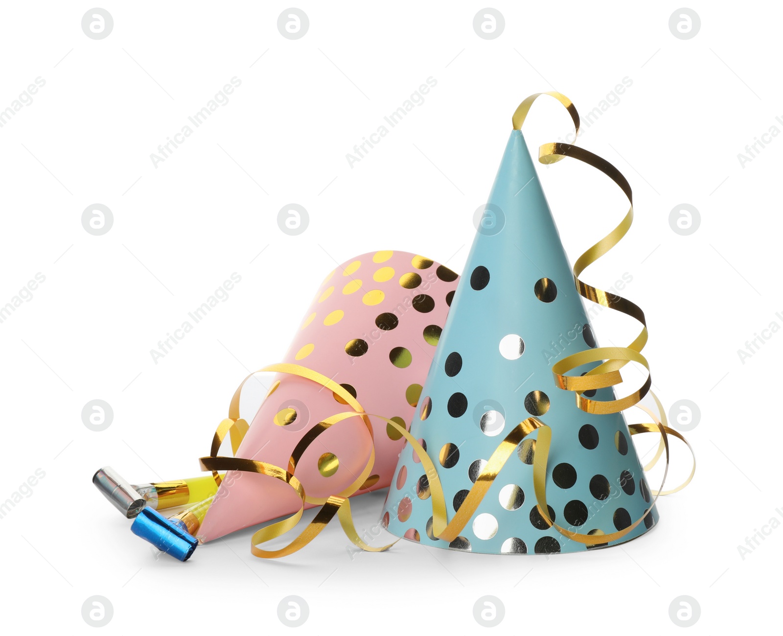 Photo of Colorful party hats, blowers and confetti streamers on white background