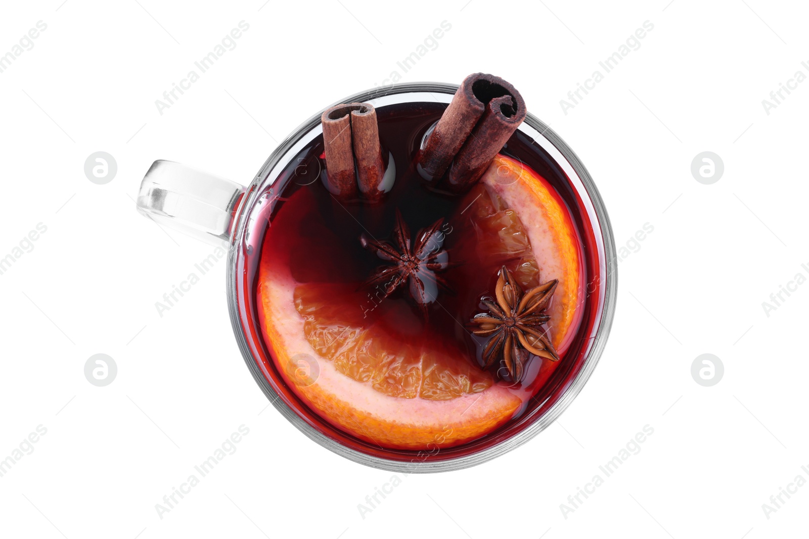 Photo of Aromatic mulled wine in glass cup isolated on white, top view