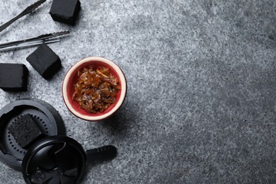 Flat lay composition with parts of hookah on grey table, space for text