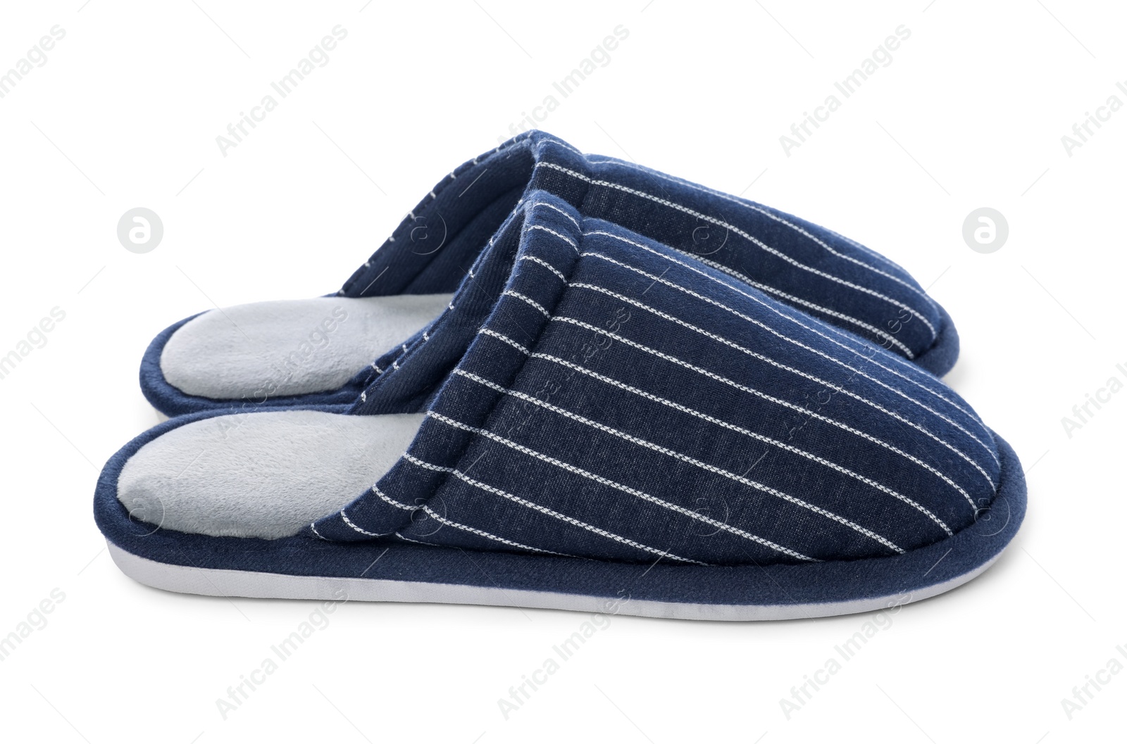 Photo of Pair of striped slippers isolated on white