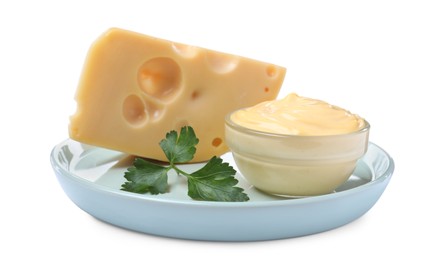 Photo of Tasty cheese, sauce and parsley on white background
