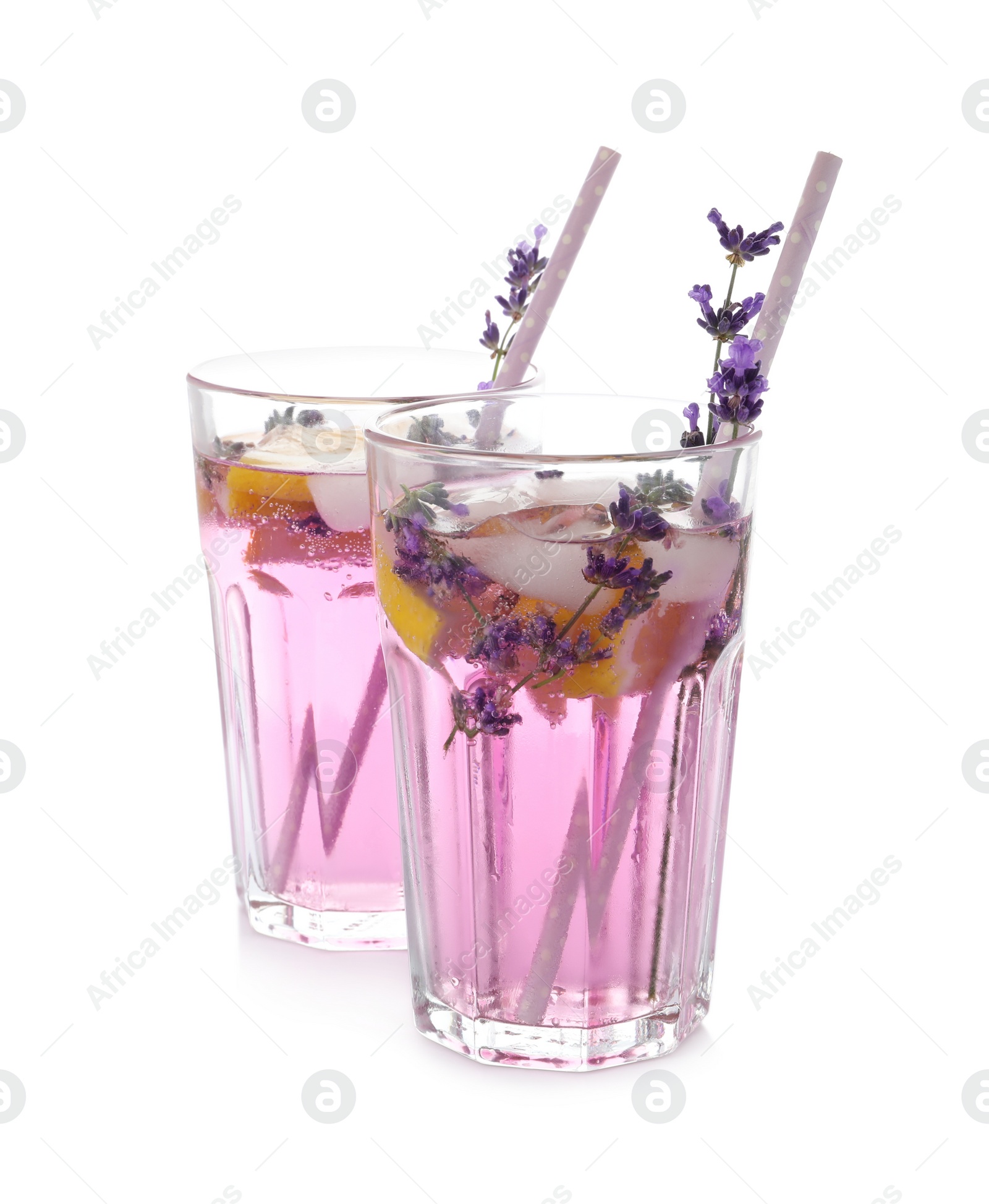 Photo of Fresh delicious lemonade with lavender and straws on white background