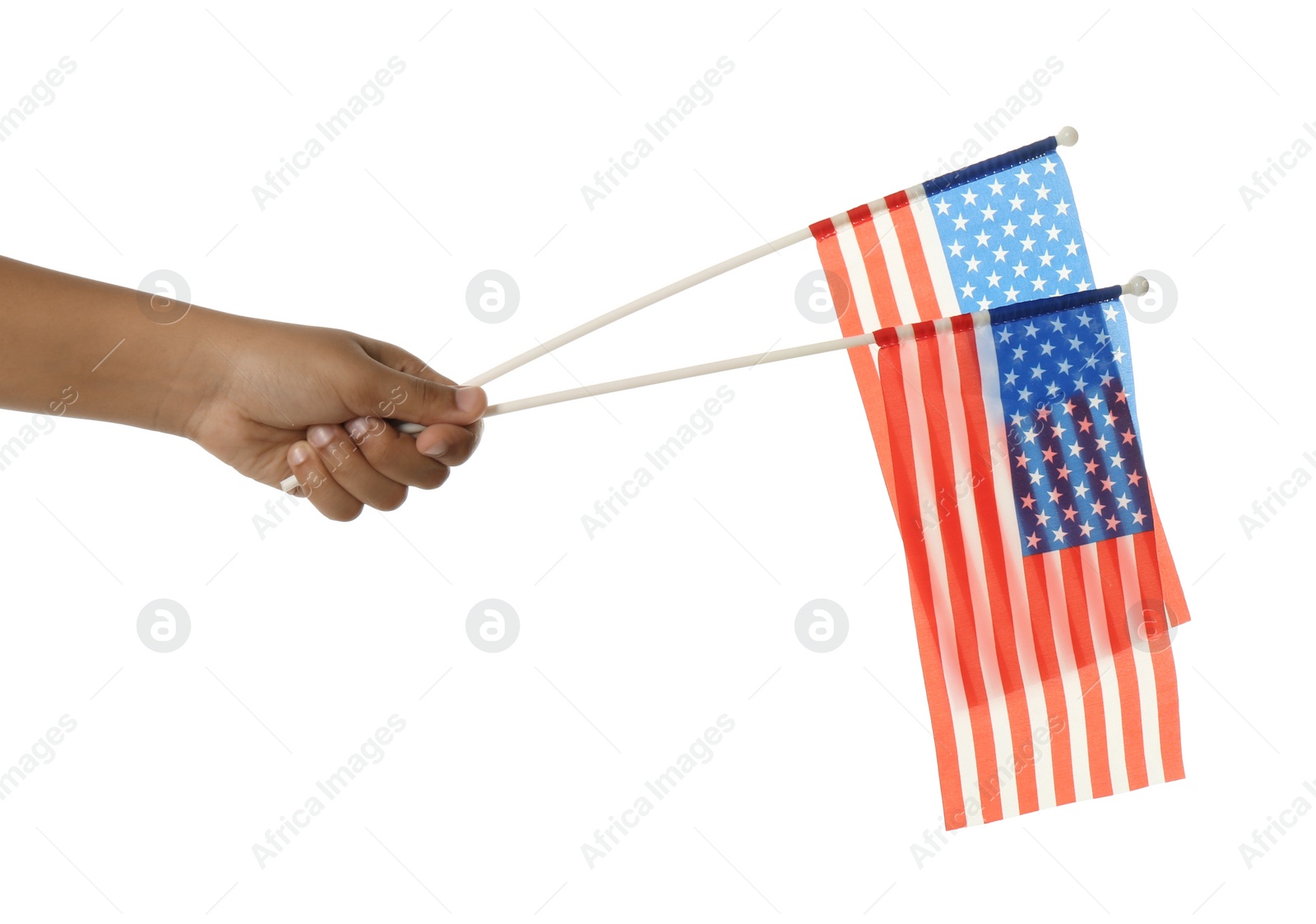 Photo of African-American child holding national flags on white background, closeup