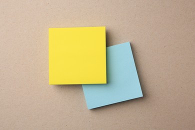 Photo of Blank paper notes on beige background, flat lay