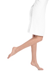 Photo of Woman with beautiful legs and feet on white background, closeup. Spa treatment