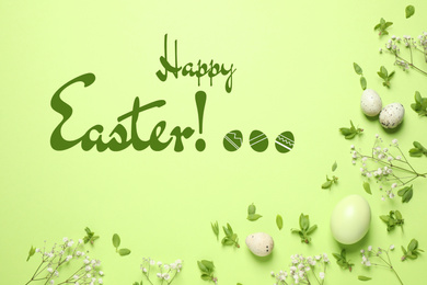 Image of Flat lay composition with eggs and text Happy Easter on light green background