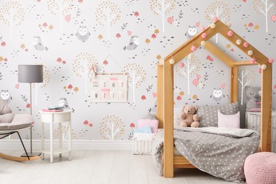 Image of Modern room interior for child with comfortable bed and cute wallpapers