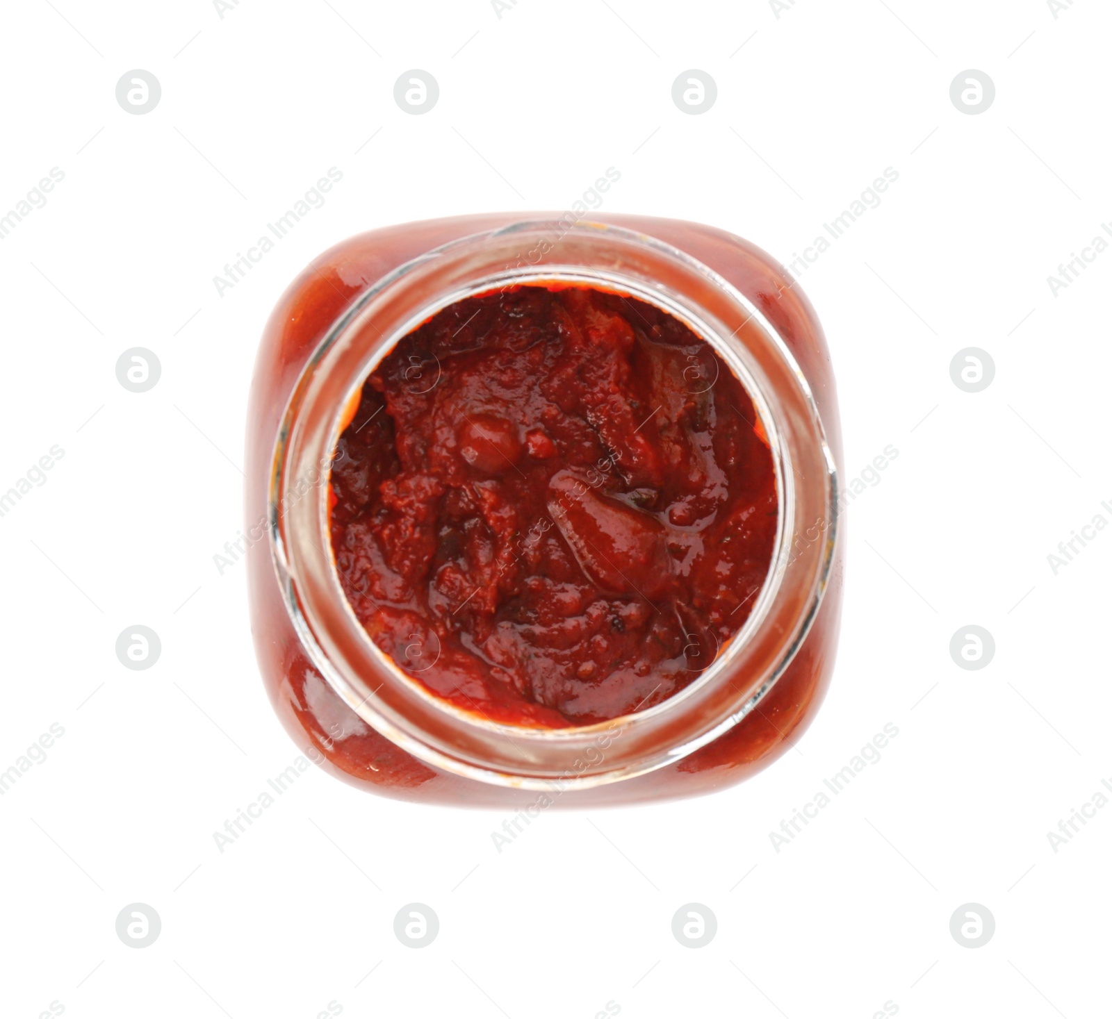 Photo of Jar of tomato paste isolated on white, top view
