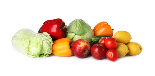 Pile of fresh fruits and vegetables isolated on white