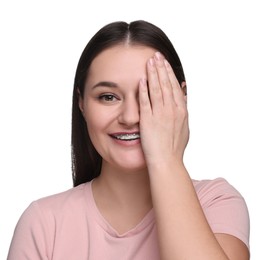 Photo of Beautiful woman covering her eye on white background