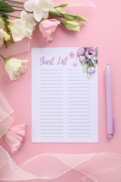 Photo of Guest list, pen, tulle fabric and beautiful flowers on pink background, flat lay. Space for text