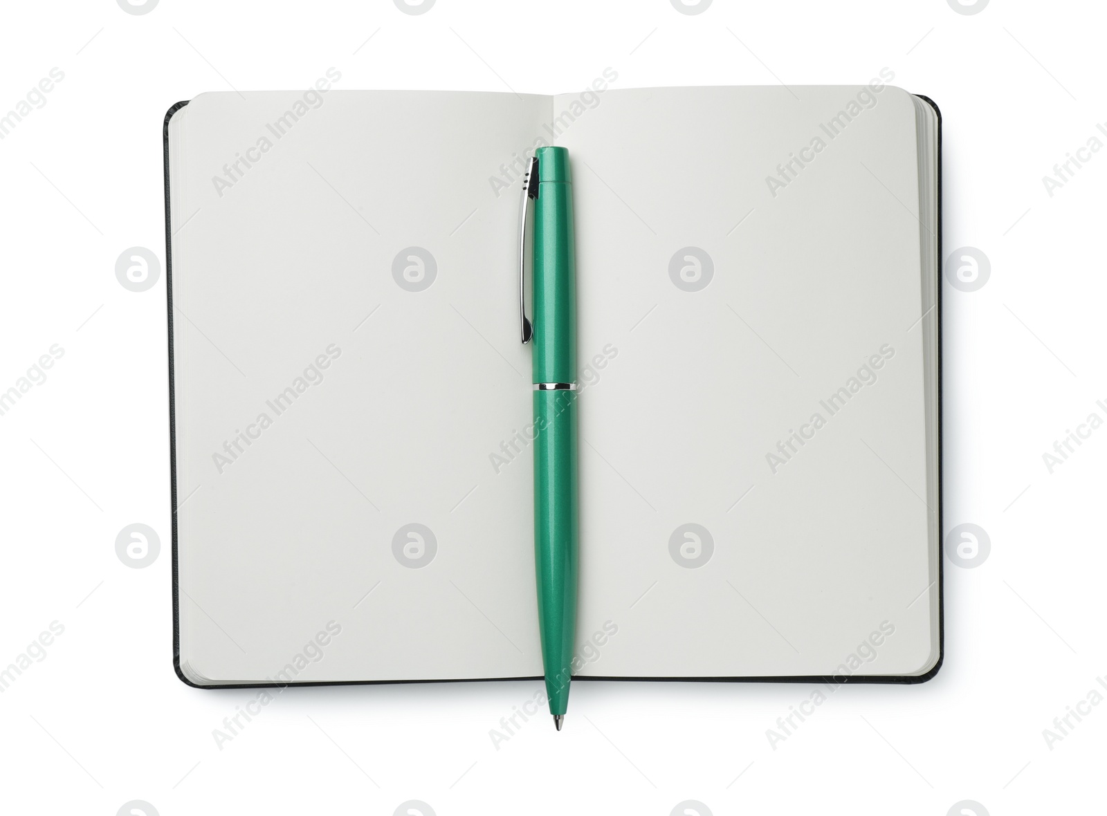 Photo of Open notebook with blank pages and pen isolated on white, top view