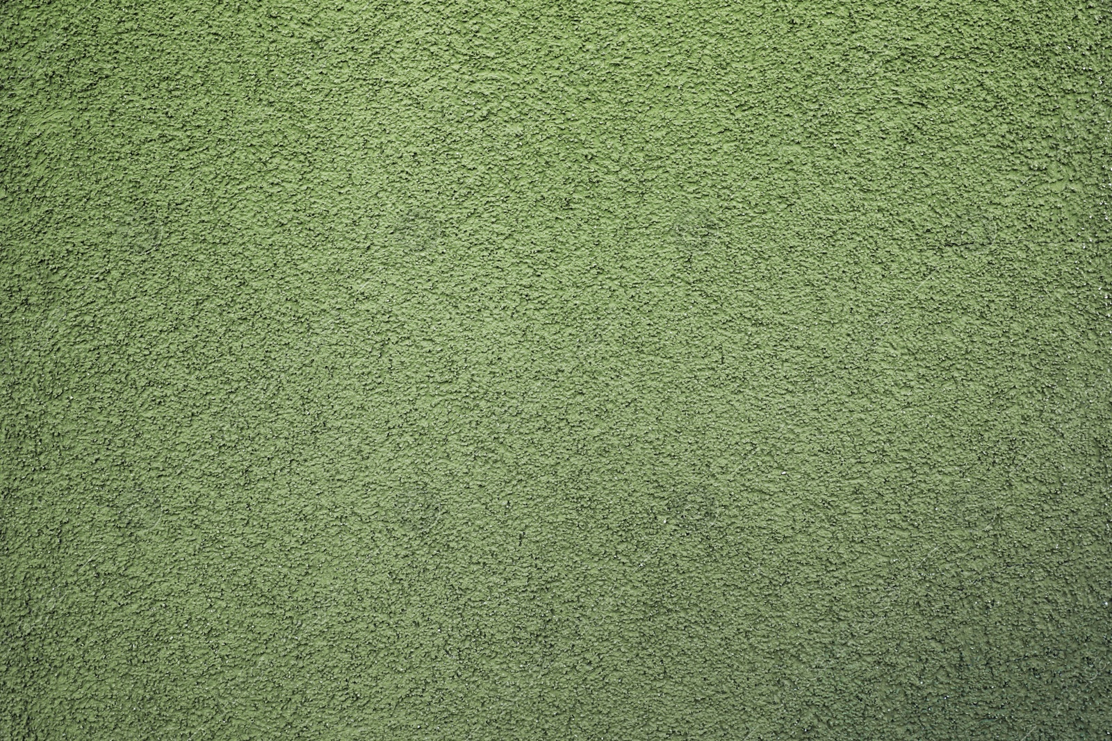 Photo of Texture of green plaster wall as background