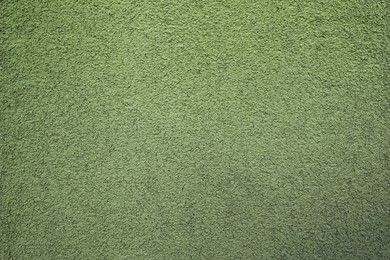 Photo of Texture of green plaster wall as background