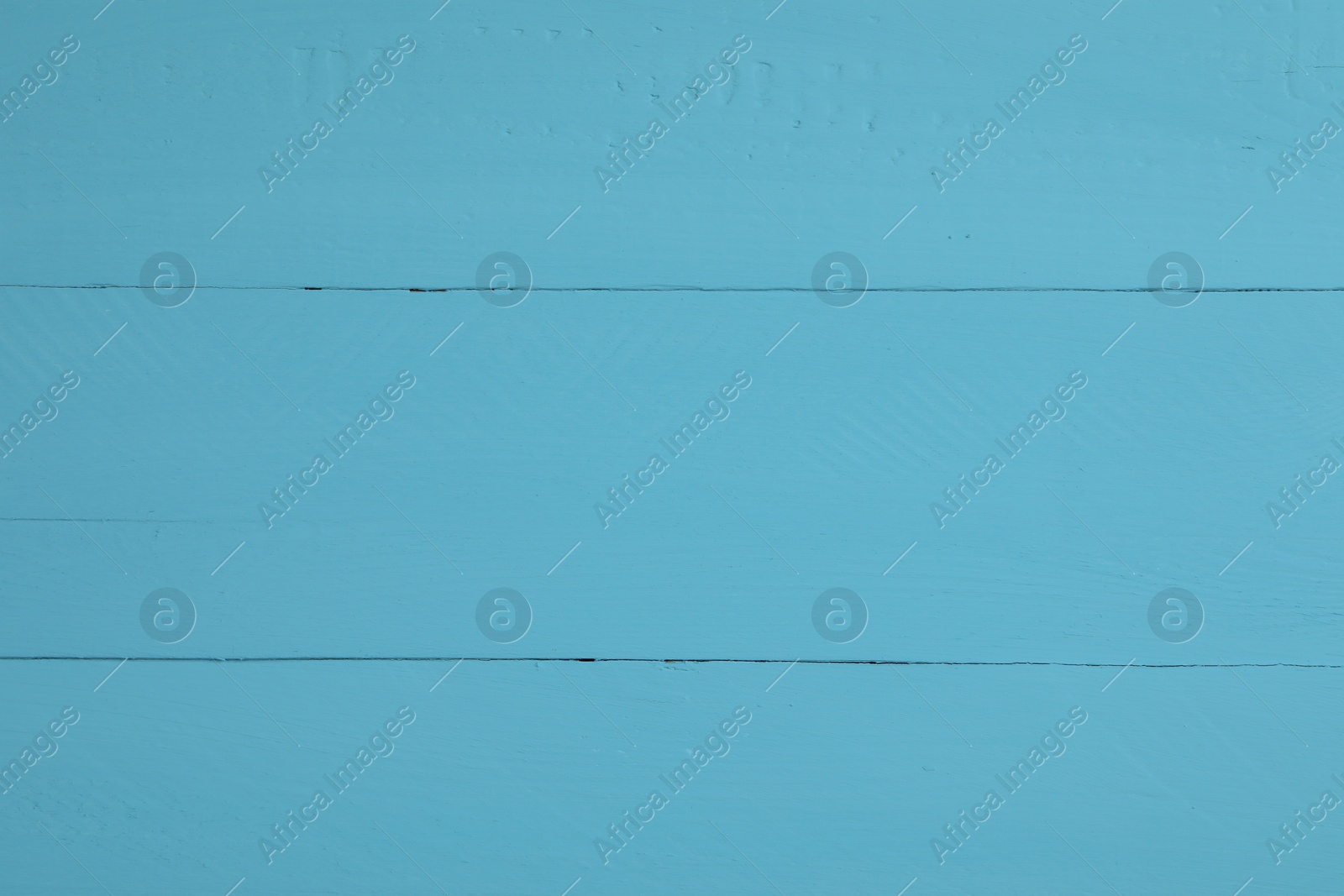 Photo of Texture of light blue wooden surface as background, closeup