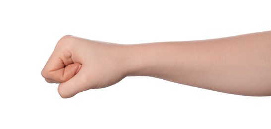 Photo of Playing rock, paper and scissors. Woman showing fist on white background, closeup