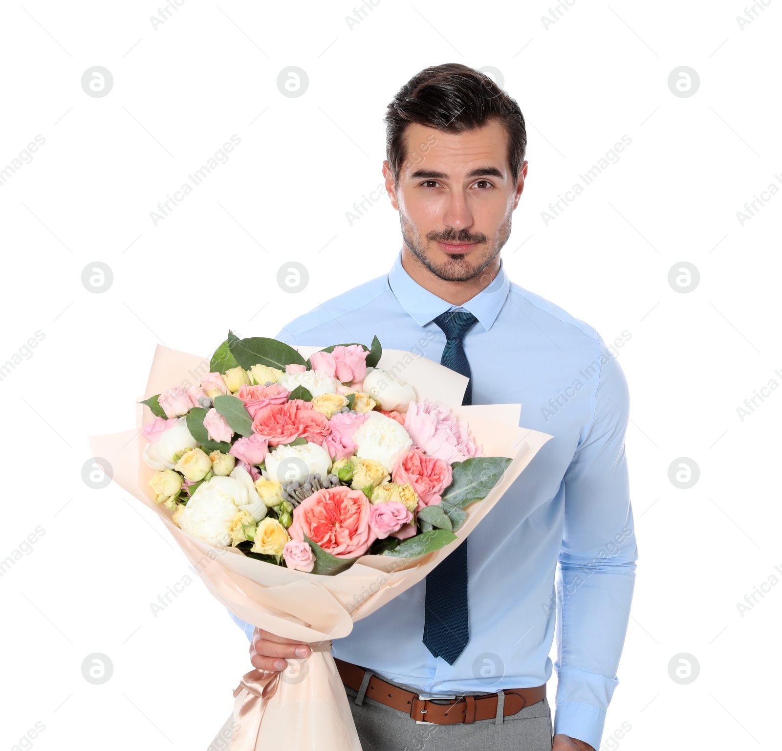 Photo of Young handsome man with beautiful flower bouquet on white background